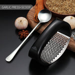 new garlic press + scoop black with spoon