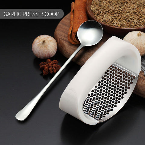 new garlic press + scoop white with spoon