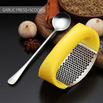 new garlic press + scoop yellow with spoon